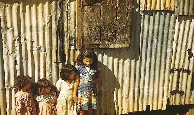 Children in a company housing settlement, 1941, in Puerto Rico.