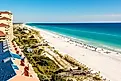 Miramar Beach stretch in Destin, Florida, with emerald green Gulf waters.
